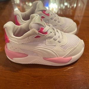 Puma toddler sneakers . Size 6 never worn.